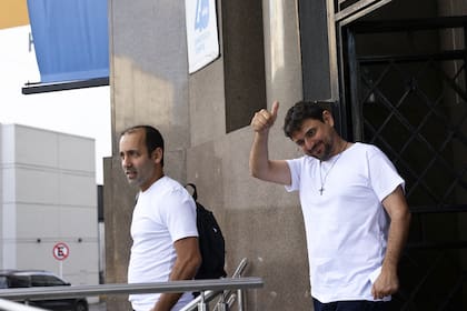 Itai Hagman y Juan Grabois