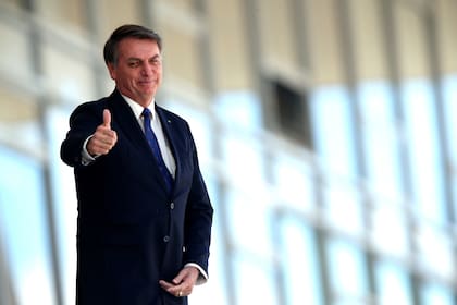El presidente brasileño Jair Bolsonaro en la puerta del Palacio Planalto