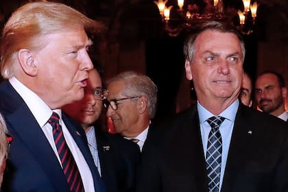 Donald Trump y Jair Bolsonaro, aliados ideológicos y políticos, ambos enfrentados a Lula (Archivo)