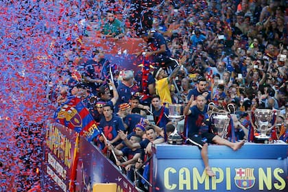 Al frente en el festejo de la segunda Champions League que ganó con Barcelona, en 2015