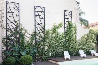 Ideas para intervenir y darle onda a las paredes exteriores con piedra, metal o madera