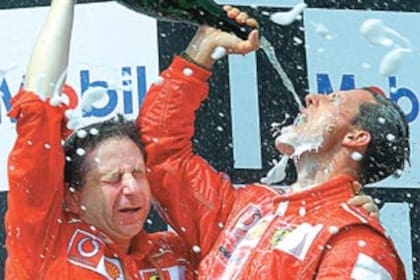 Jean Todt y Michael Schumacher, embriagados por tanto éxito