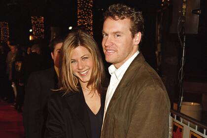 Aniston con Tate Donovan, el actor que conoció en el set de Friends