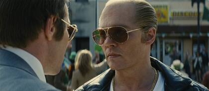 Joel Edgerton (el hombre del FBI) y Depp (el jefe mafioso), frente a frente