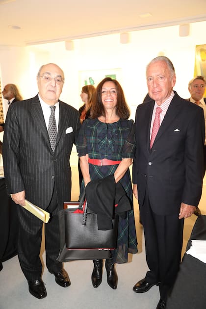 Jorge Aufiero, Carolina Barrios y Daniel Funes de Rioja, presidente de la UIA