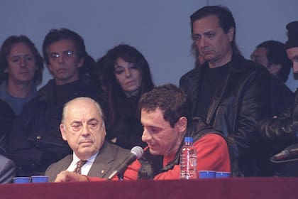 Juan Carlos Saravia, con Mollo, líder de Divididos, en 2001
