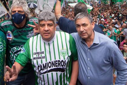Juan Chulich (derecha), junto a Pablo Moyano y “Manguera” Pérez, de Camioneros
