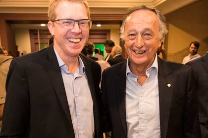 Juan Curutchet, presidente del Banco Provincia, y Miguel Acevedo, titular de la UIA