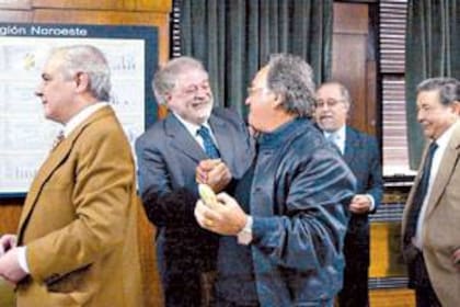 En 2002, con los sindicalistas Juan José Zanola y Luis Barrionuevo