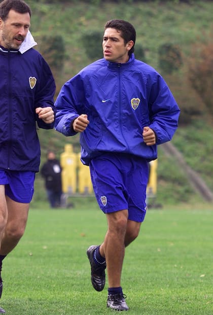 Juan Roman Riquelme and action figure with action figure Ruben Araguas at Kawasaki Stadium on November 23, 2000