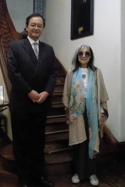 Junto a María Kodama