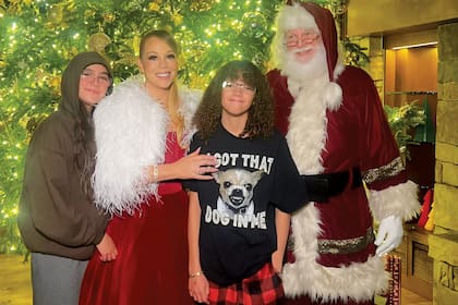 Junto a sus mellizos, que ya tienen 13 años.