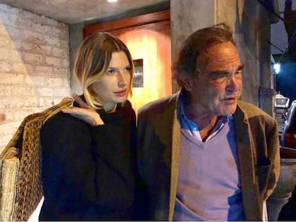 Junto al director de cine Oliver Stone