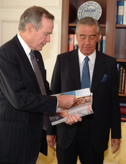 Junto al entonces presidente de EEUU George Bush