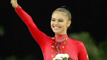 Kabaeva es gimnasta olímpica y ganadora de la medalla de oro en los Juegos Olímpicos de 2000, en Sidney, Australia.