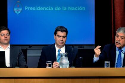 Kicillof, Capitanich y De Vido, durante la presentación de la nueva ley de telecomunicaciones