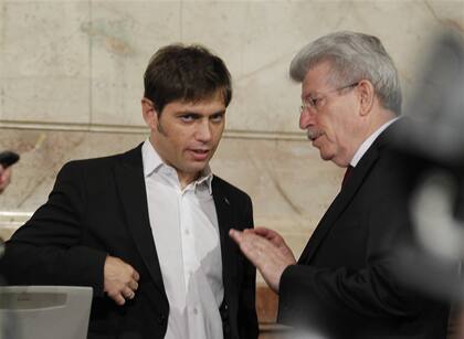 Los entonces ministro de Economía, Axel Kicillof, y presidente del Banco Central, Carlos Fábrega, quienes devaluaron 23% el peso en enero de 2014