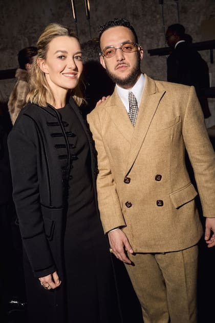 The host poses with the successful C Tangana