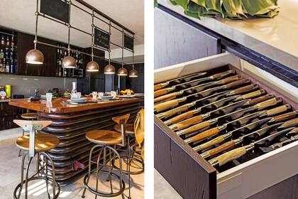 Aquí, el plato fuerte es la barra hecha a medida con tapa de roble negro sobre una base de caños superpuestos, pintados y patinados.