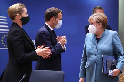 La canciller de Alemania, Angela Merkel, el presidente de Francia, Emmanuel Macron, y la primera ministra de Dinamarca, Mette Frederiksen