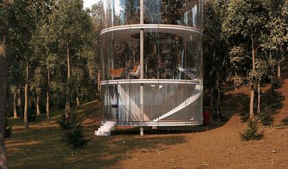 La casa de vidrio está emplazad en el medio de un bosque