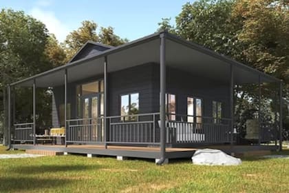 El gris grafito o negro aportan vanguardia y personalidad a una casa, combina muy bien con un entorno verde