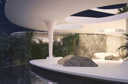 La casa está rodeada por un lago artificial