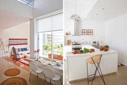 La cocina se ubicó en lo que era una recepción, con la mesada balconeando a la escalera y parcialmente integrada en el living,