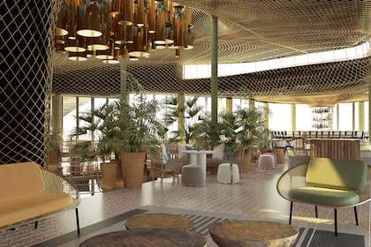 La decoración es en tonos dorados, colores neutros y madera