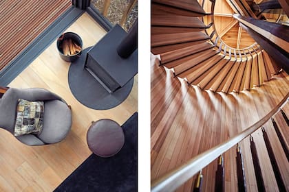 La escalera tiene peldaños y pasamanos curvos hechos a medida (Rind Routing).