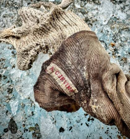 La etiqueta con el nombre de A.C. Irvine