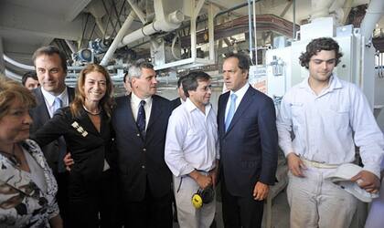 La ex ministra de Industria, Débora Giorgi, y el ex gobernador Scioli participaron en la inauguración del molino