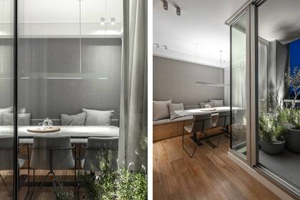 La fina luminaria de aluminio (Griscan) da luz difusa hacia arriba y de modo puntual sobre la mesa.