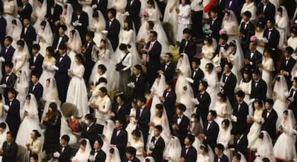 La Iglesia de la Unificación es conocida por celebrar bodas multitudinarias