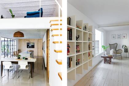 La madera clara y los muebles blancos de la cocina mantienen continuidad con la escalera del entrepiso.