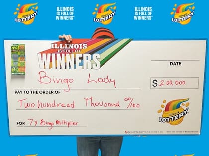 La madre de cuatro hijos posó para una foto de celebración después de ganar el gran premio