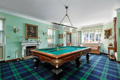 La mesa de billar, una de las principales atracciones de la sala de juegos.