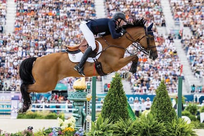 La modelo compartió en sus redes una foto de su novio en plena competencia.