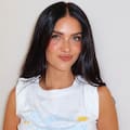 Con bikini, remera de la selección y figuritas: la producción de Zaira Naira para recibir el Mundial