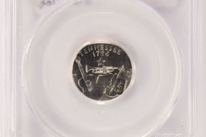 La moneda de 25 centavos del estado de Tennessee del año 2002-D, fue valorada en hasta US$8.000 debido a errores de acuñación y su baja circulación (sullivannumismatics)