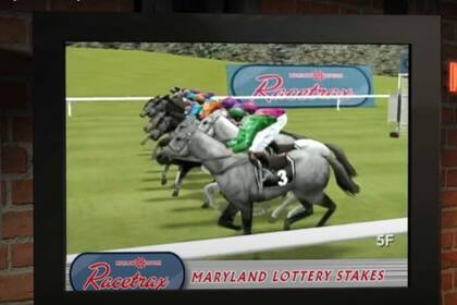 La mujer ganó en Racetrax, un juego de lotería que simula una carrera de caballos
