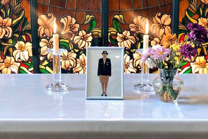 La oficial de la Casa Militar que murió en un accidente de tránsito, en un porta retrato que colocaron en la capilla de la Casa Rosada