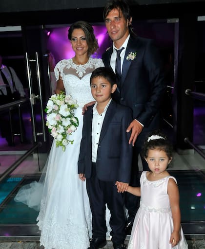 La pareja junto a la pequeña Giuliana y al hijo de él, Franco, fruto de su relación anterior