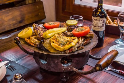La parrillada a la mesa, con la carne en el punto pedido por el comensal