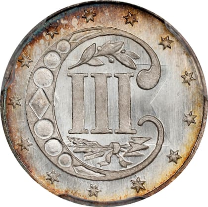 La pieza lleva en número romanos su valor nominal