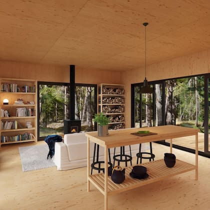 .La presencia de materiales nobles como la madera es una constante, al igual que los grandes ventanales que conectan el verde exterior con el interior