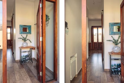 La puerta principal es antigua y ganó entidad con dos nuevos paños fijos laterales y otro, superior.