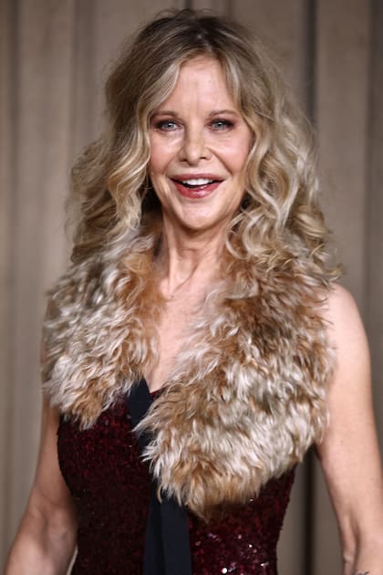 La reina de las comedias posó simpática frente a los paparazzi de la gran noche de la familia Clooney