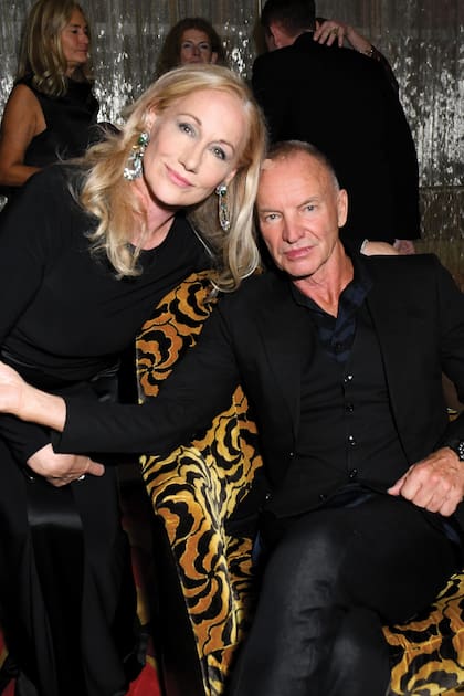 La socialité y empresaria Amy Sacco con Sting