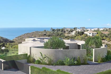 La terraza con un diseño de plantas y muros verdes